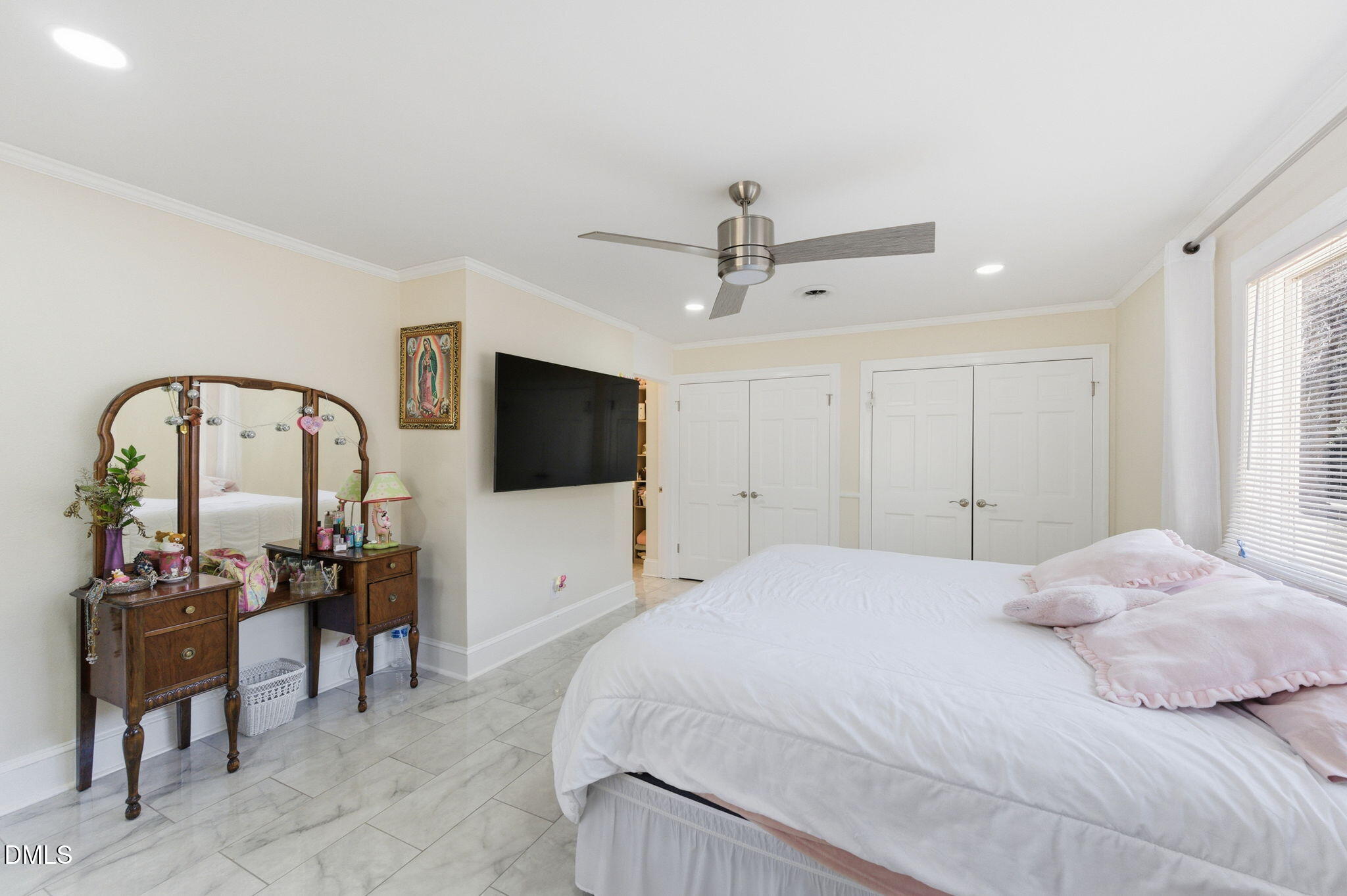 110 Circle Drive Spring Hope, NC 27882 - Photo 6 of 61 a bedroom with a bed a television and a large window