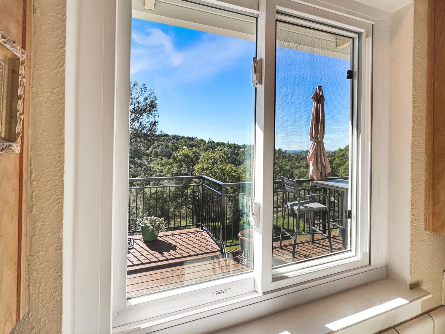 10100 Indian Hill Road Newcastle, CA 95658 - Photo 13 of 41 a view of a glass door and a window
