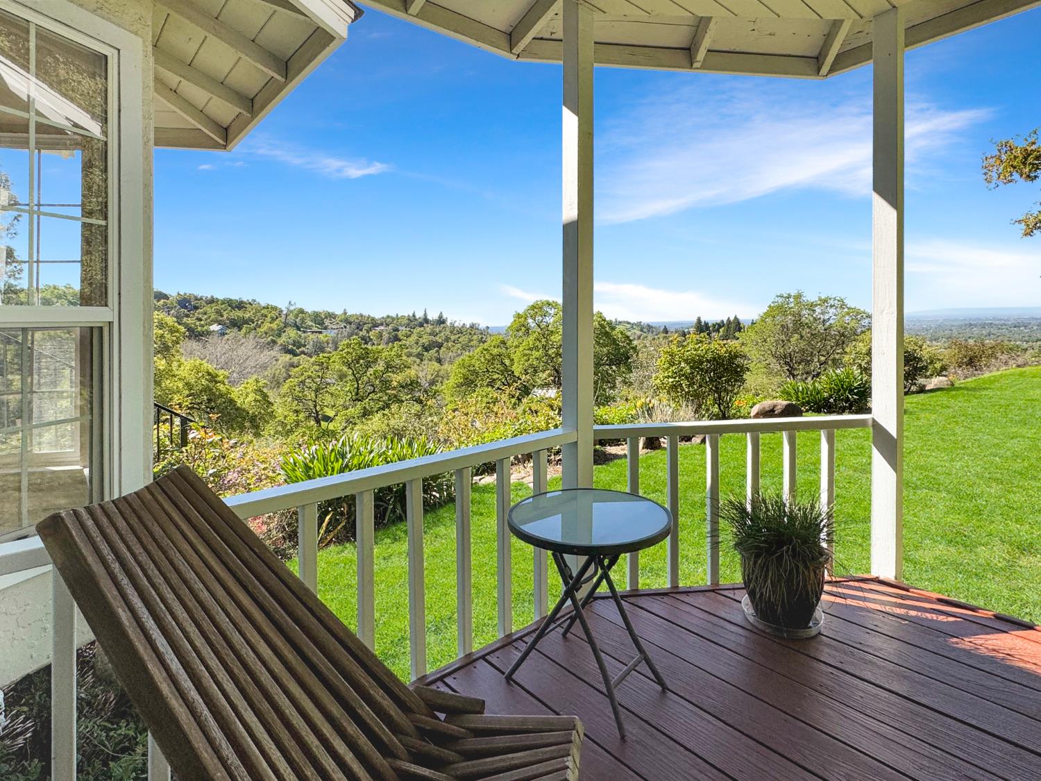 10100 Indian Hill Road Newcastle, CA 95658 - Photo 20 of 41 a view of a balcony with chairs