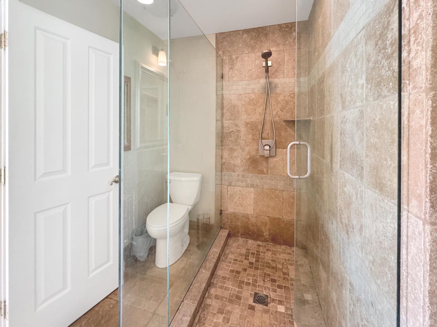 10100 Indian Hill Road Newcastle, CA 95658 - Photo 26 of 41 a bathroom with a toilet and a shower