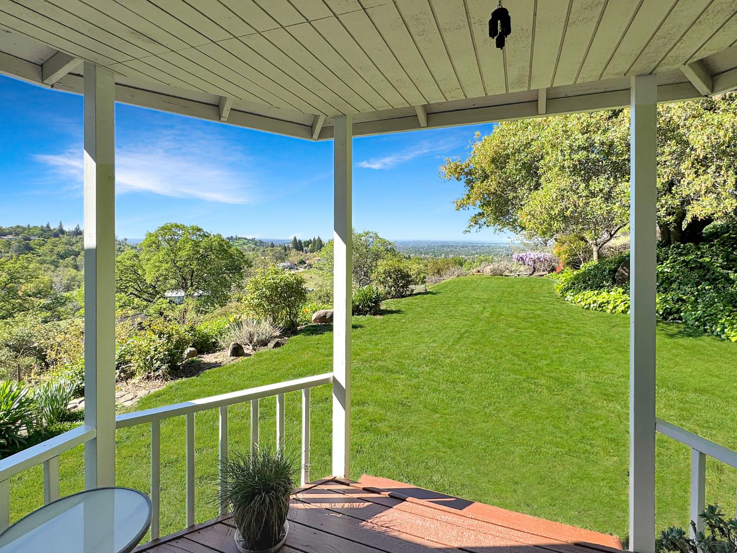 10100 Indian Hill Road Newcastle, CA 95658 - Photo 7 of 41 a balcony with an outdoor seating space