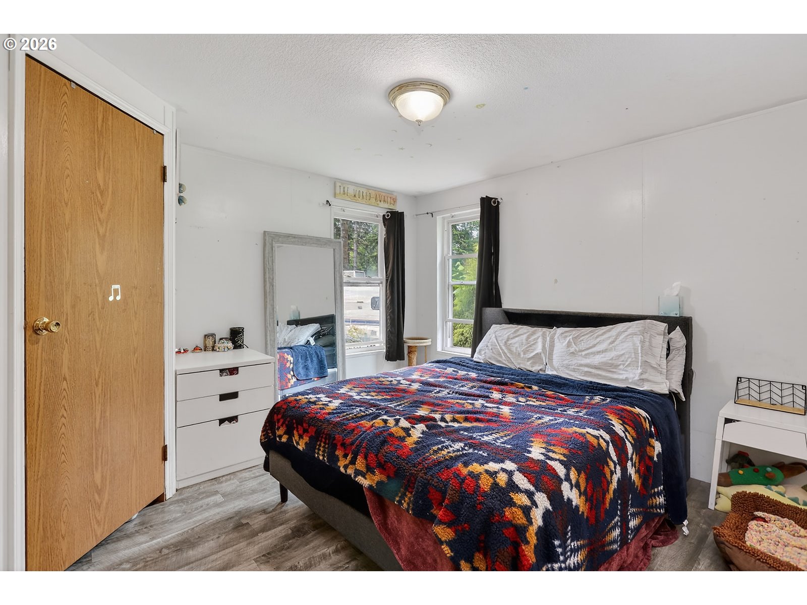 142 Spring Lane South Stevenson, WA 98648 - Photo 15 of 29 a bedroom with a bed and a window