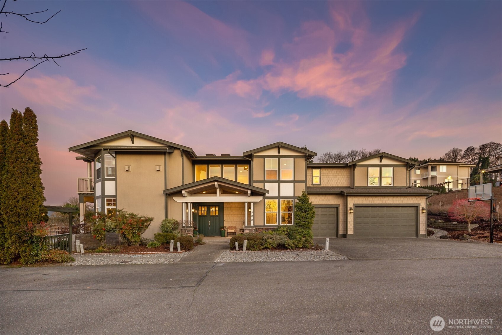 1500 South 5th Place Renton, WA 98057 - Photo 1 of 40 a front view of a house with a yard and balcony