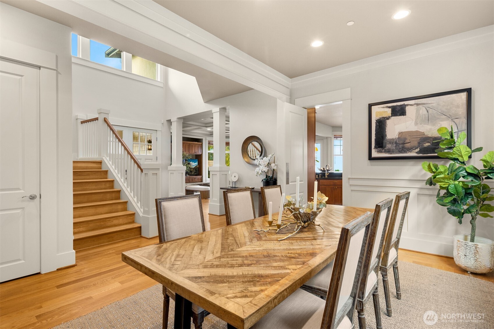 1500 South 5th Place Renton, WA 98057 - Photo 16 of 40 a view of a dining room with furniture window and wooden floor