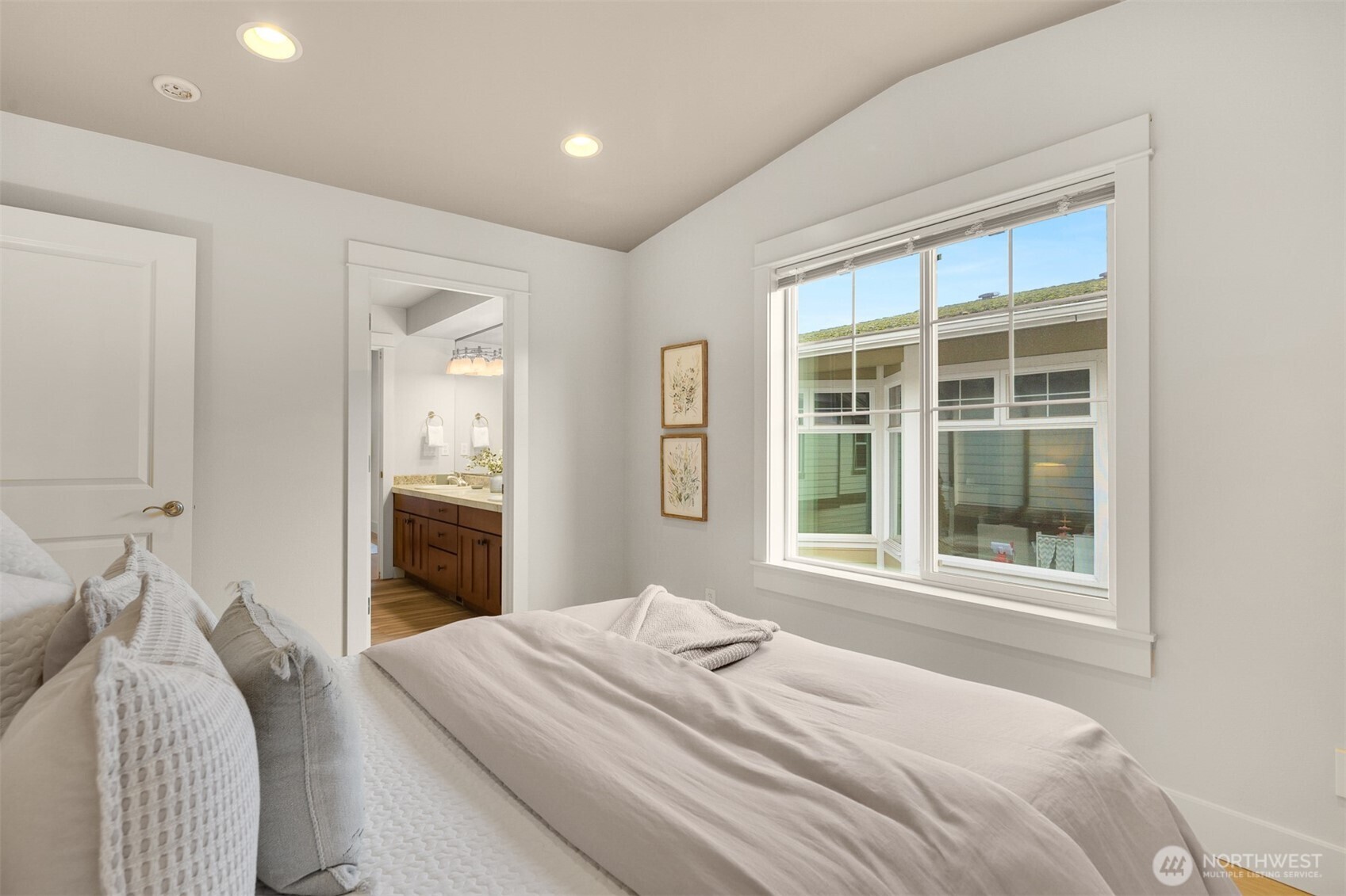 1500 South 5th Place Renton, WA 98057 - Photo 20 of 40 a bedroom with a bed and a window