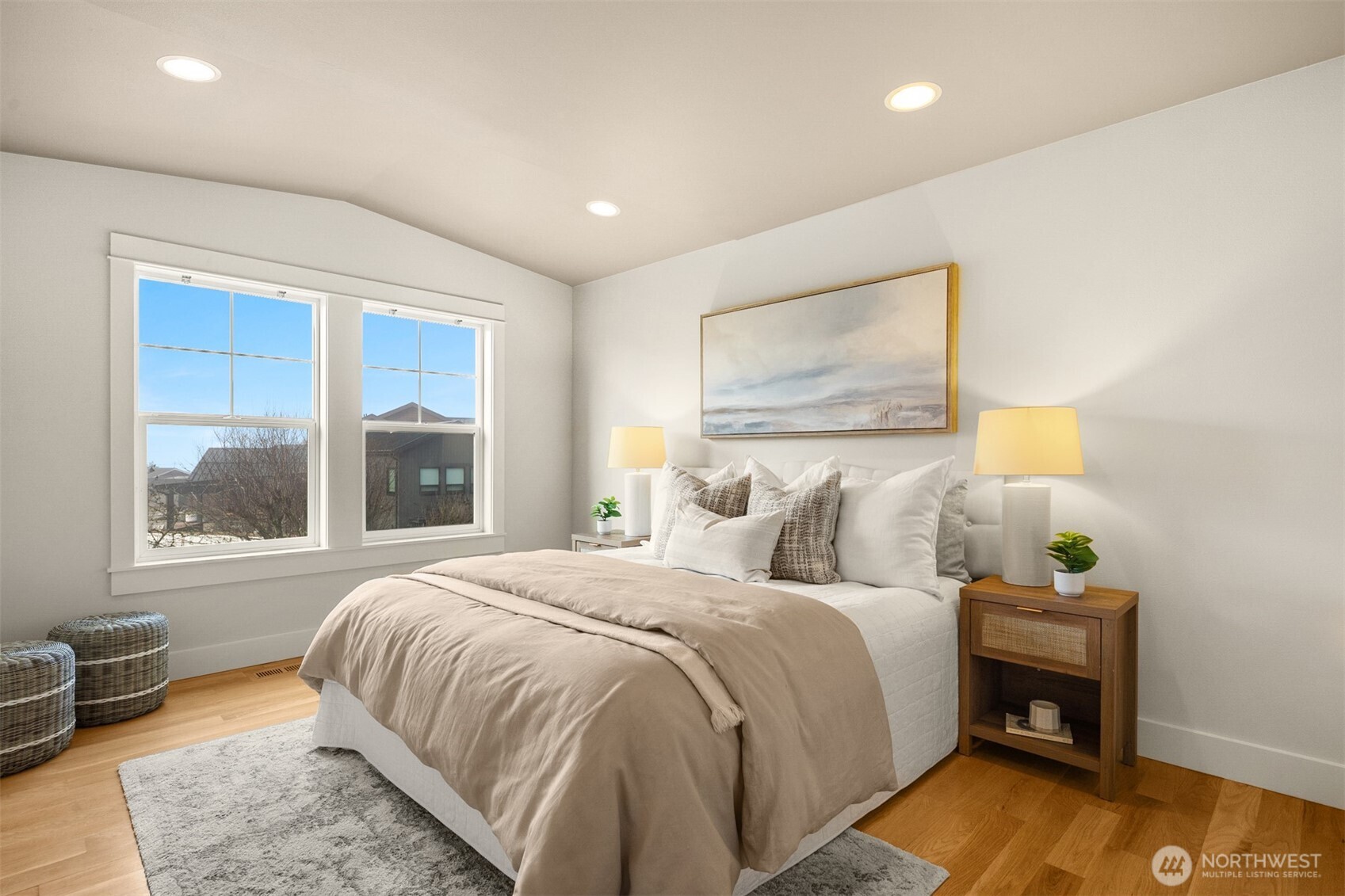 1500 South 5th Place Renton, WA 98057 - Photo 24 of 40 a bedroom with a bed and wooden floor