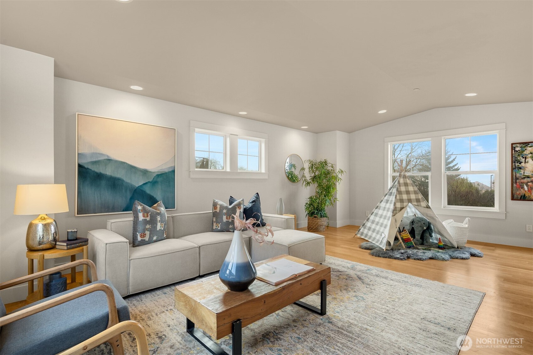 1500 South 5th Place Renton, WA 98057 - Photo 27 of 40 a living room with furniture and wooden floor