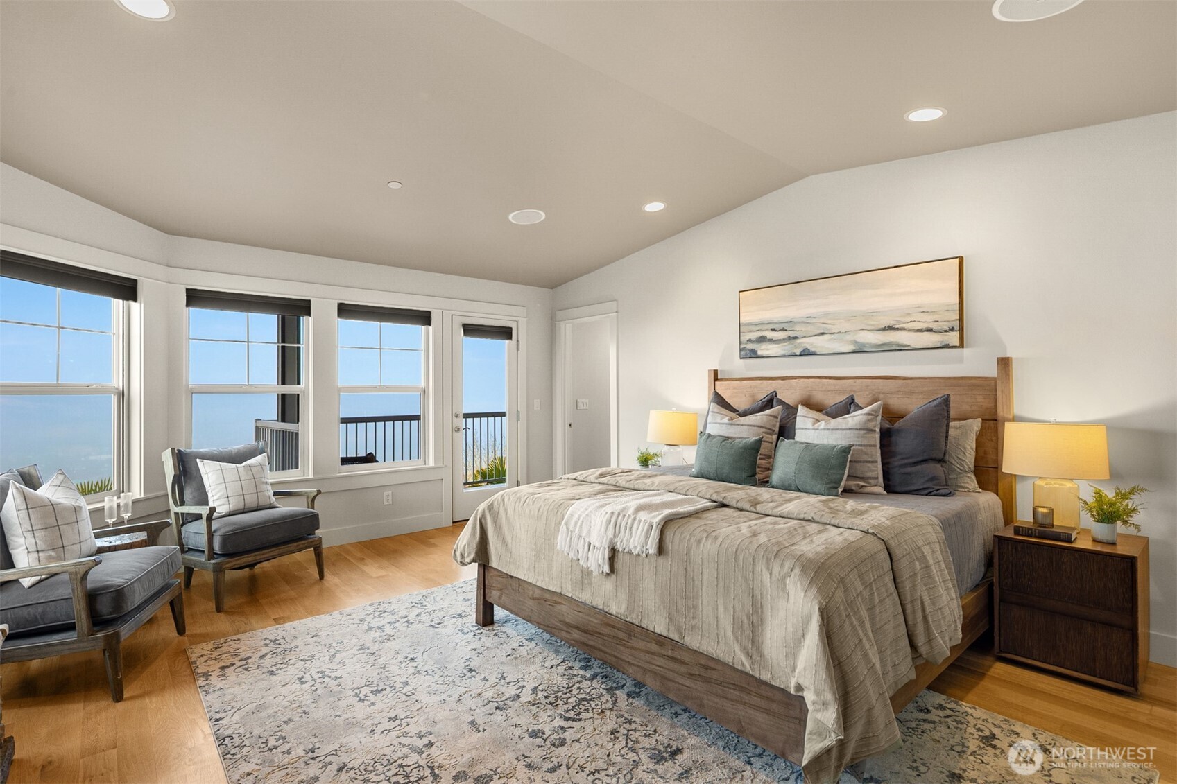 1500 South 5th Place Renton, WA 98057 - Photo 29 of 40 a bedroom with a bed and wooden floor