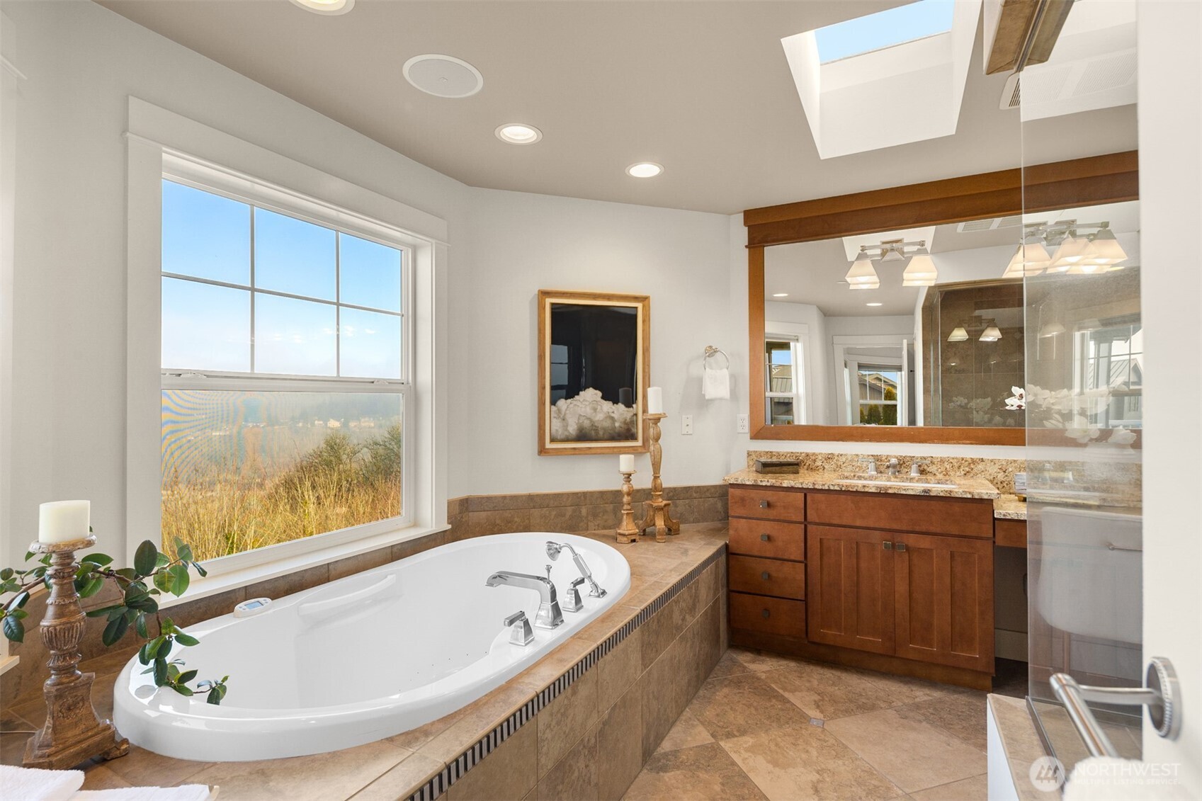 1500 South 5th Place Renton, WA 98057 - Photo 34 of 40 a large spacious bathroom with a large tub and sink