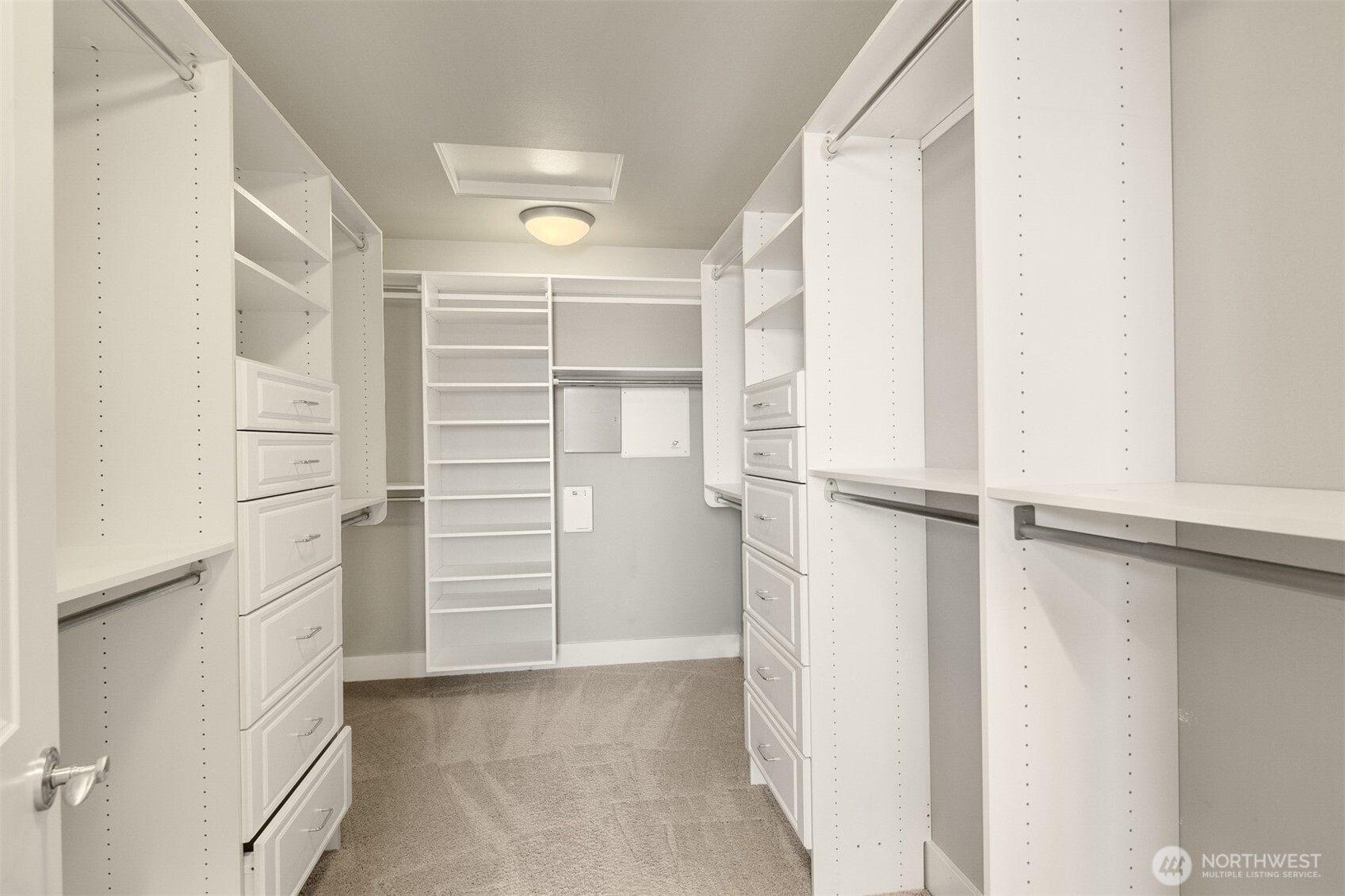 1500 South 5th Place Renton, WA 98057 - Photo 36 of 40 a view of walk in closet with empty racks