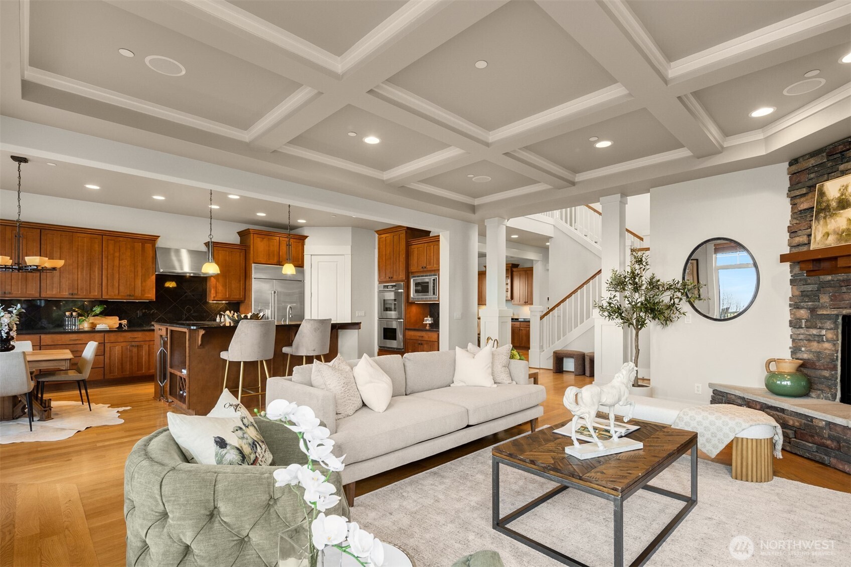 1500 South 5th Place Renton, WA 98057 - Photo 8 of 40 a living room with furniture a clock and a large window