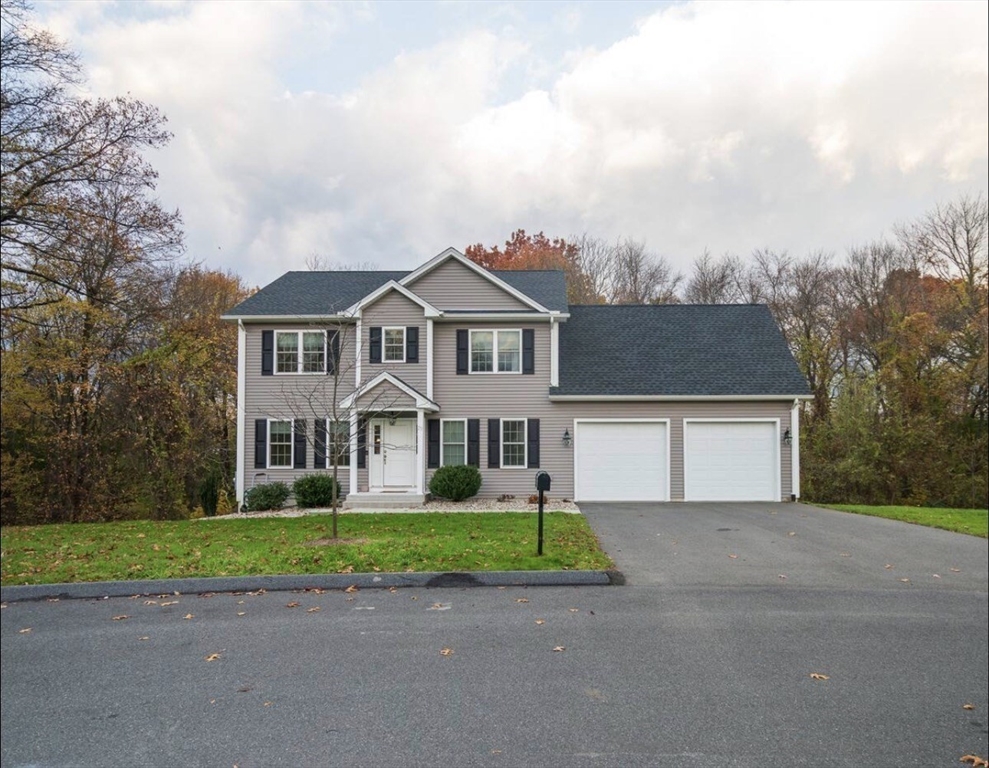 23 Ralph Street Chicopee, MA 01020 - Photo 2 of 42 a front view of house with yard and green space