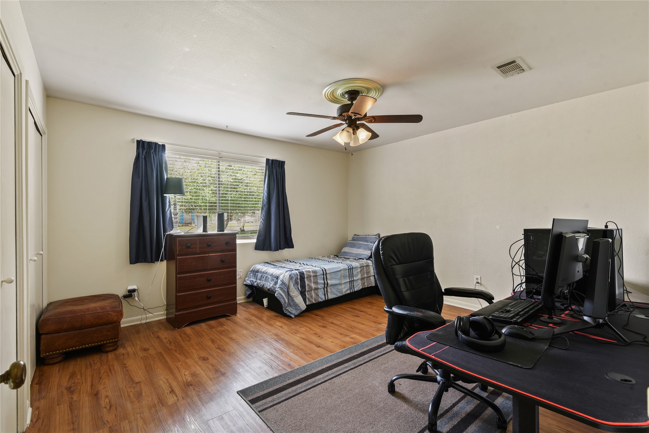 546 Georgetown Street, Unit 4 Beaumont, TX 77707 - Photo 12 of 14 a bedroom with furniture and a window