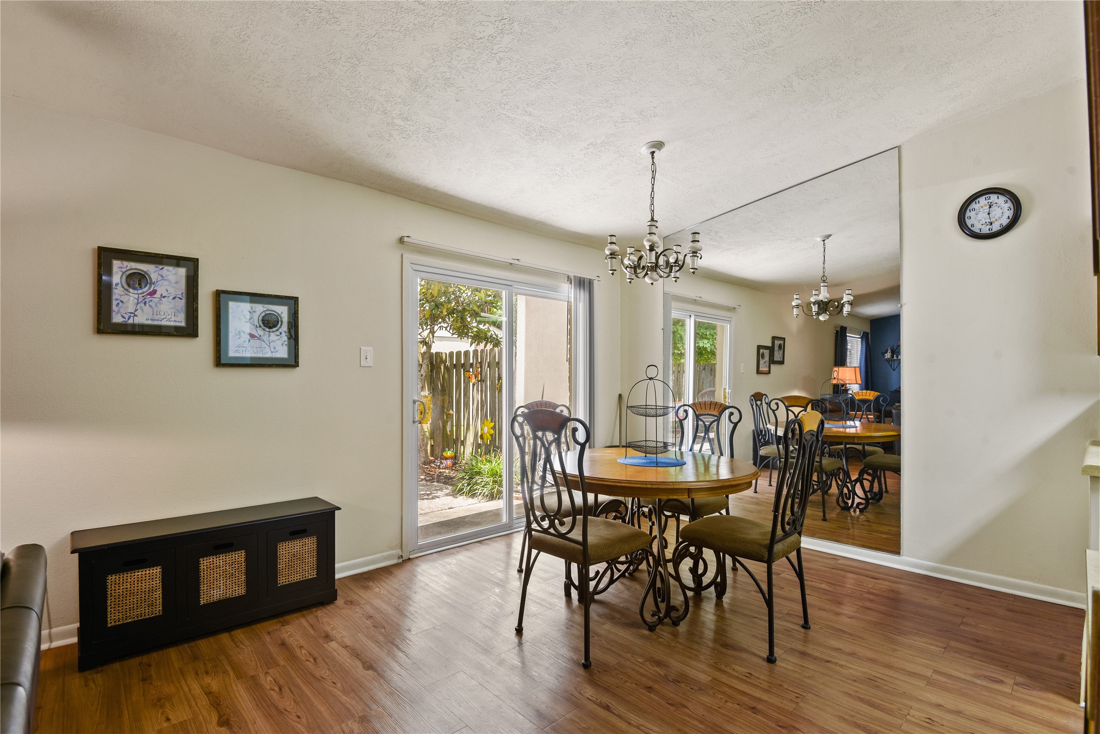 546 Georgetown Street, Unit 4 Beaumont, TX 77707 - Photo 7 of 14 a view of a dining room with furniture and wooden floor