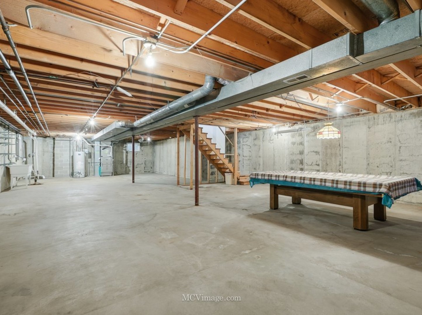 729 Eighth Avenue Addison, IL 60101 - Photo 16 of 21 a room with wooden furniture