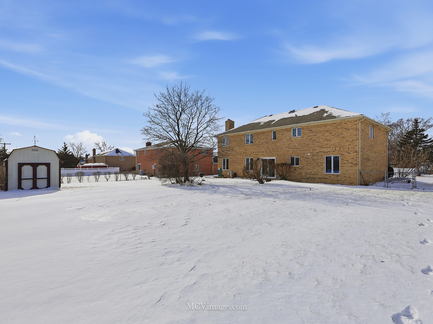 729 Eighth Avenue Addison, IL 60101 - Photo 17 of 21 a view of a house with a snow in the yard