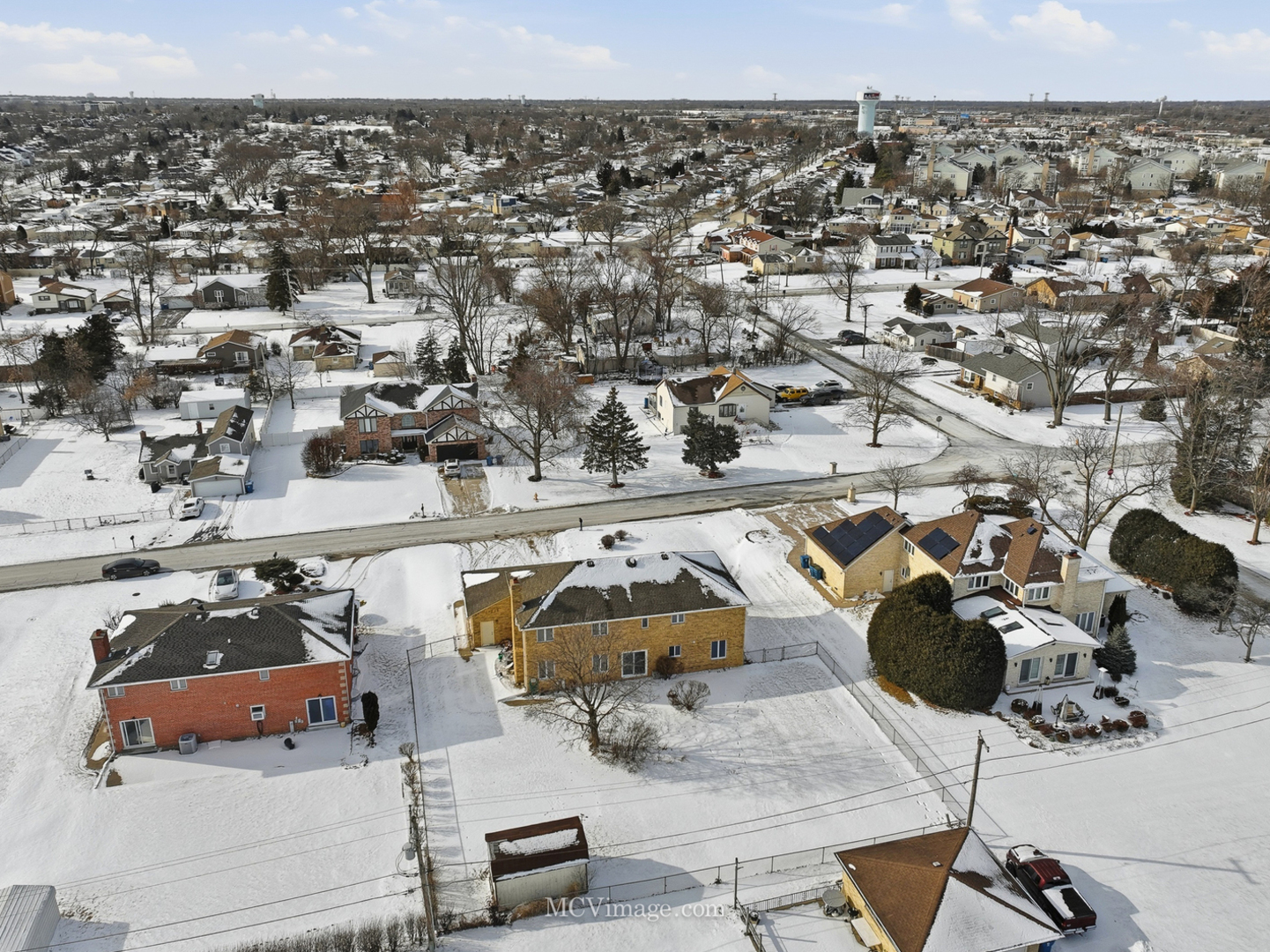 729 Eighth Avenue Addison, IL 60101 - Photo 20 of 21 an aerial view of a house with parking space