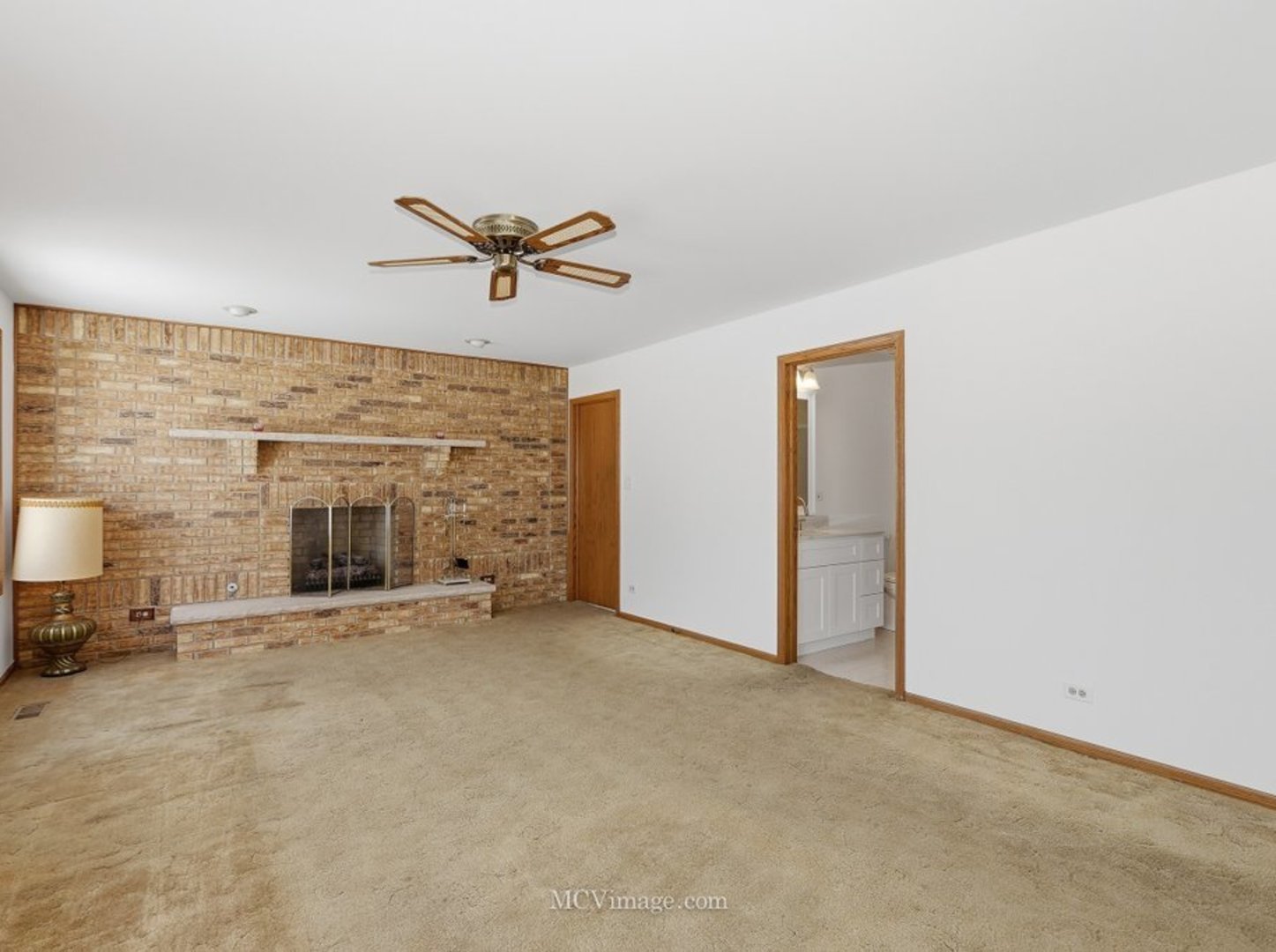 729 Eighth Avenue Addison, IL 60101 - Photo 5 of 21 a view of a livingroom with furniture and a fireplace