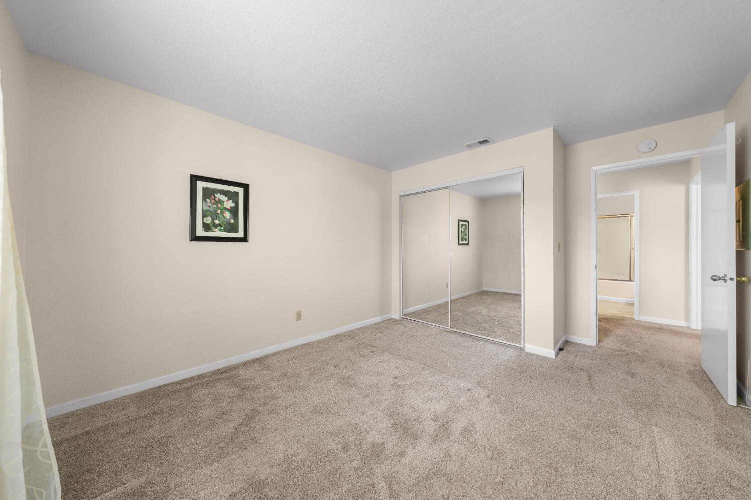 11150 Trinity River Drive, Unit 42 Rancho Cordova, CA 95670 - Photo 25 of 32 an empty room with a bathroom