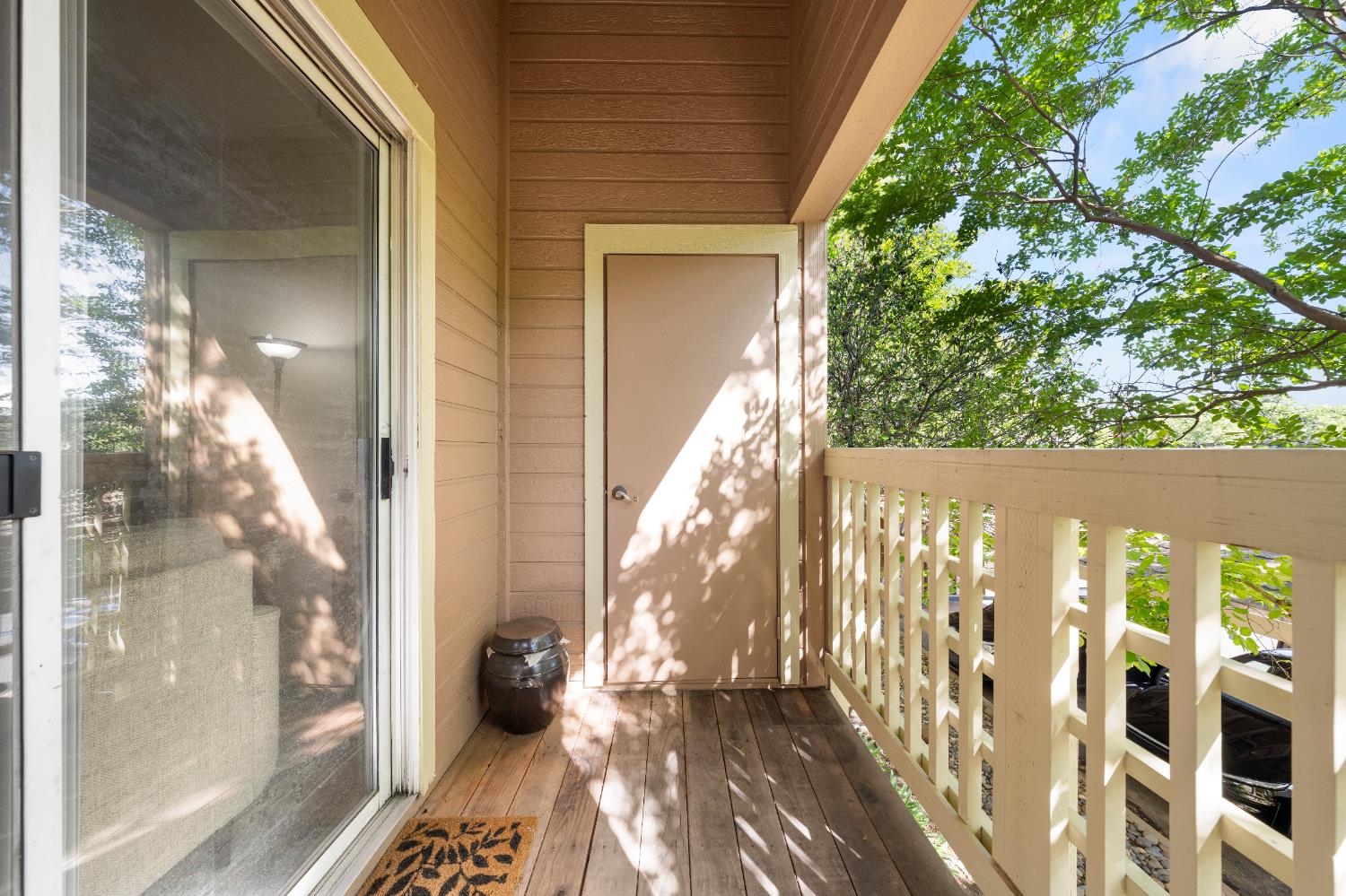 11150 Trinity River Drive, Unit 42 Rancho Cordova, CA 95670 - Photo 28 of 32 a view of a balcony with wooden floor