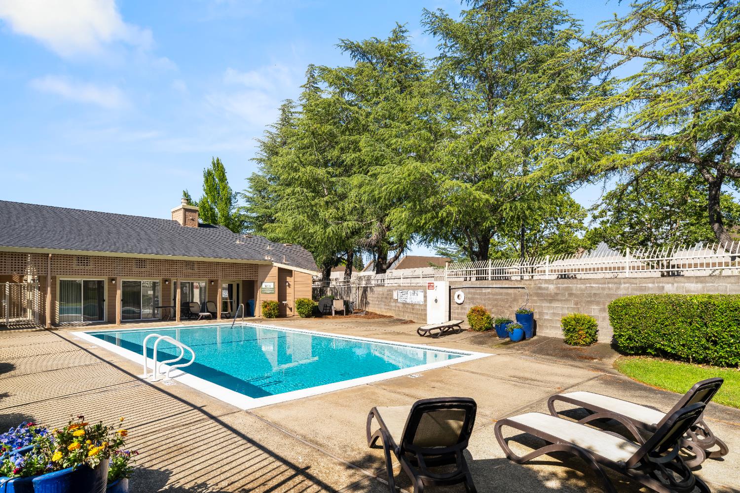 11150 Trinity River Drive, Unit 42 Rancho Cordova, CA 95670 - Photo 29 of 32 a view of a house with swimming pool and sitting area