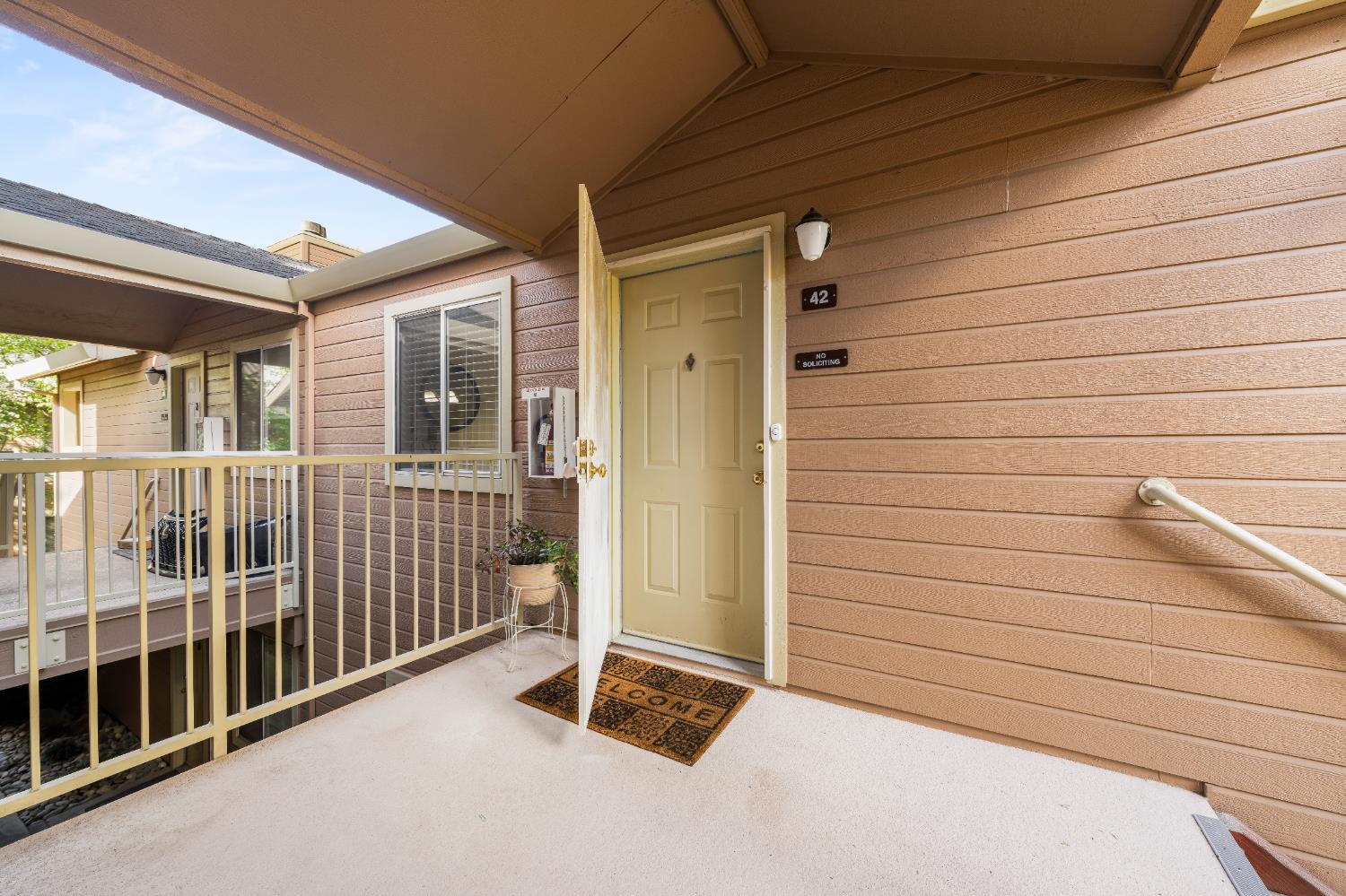 11150 Trinity River Drive, Unit 42 Rancho Cordova, CA 95670 - Photo 3 of 32 a view of a porch