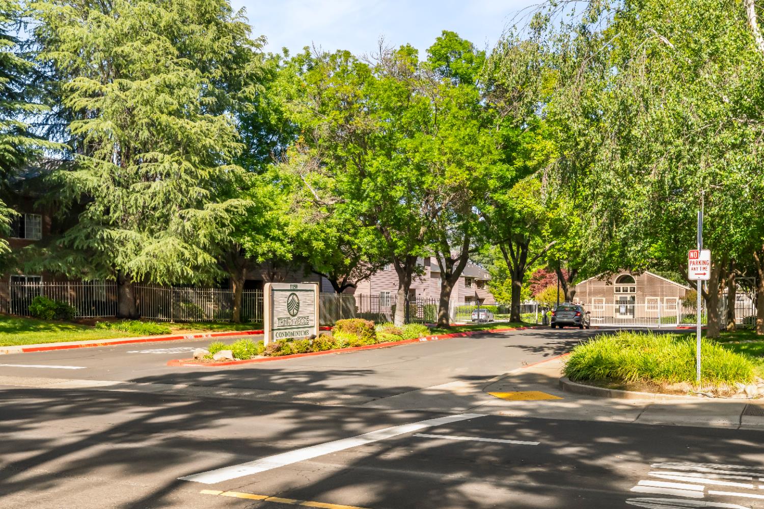 11150 Trinity River Drive, Unit 42 Rancho Cordova, CA 95670 - Photo 32 of 32 a view of a swimming pool with an outdoor space and seating area
