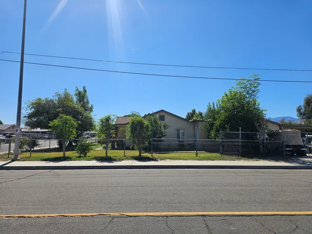 a view of swimming pool with outdoor seating and yard