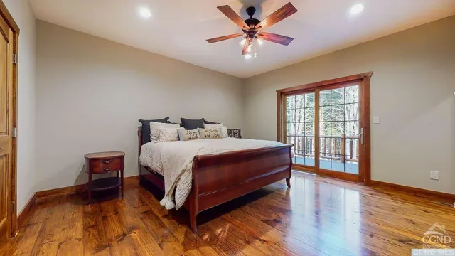 a bed room with a bed and a window