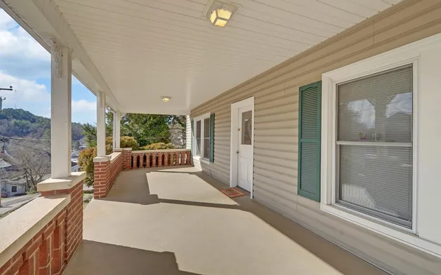 a view of a balcony with couch