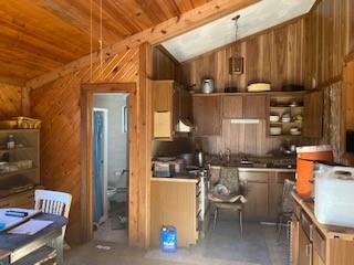 368 Church Hill Road Tionesta, PA 16353 - Photo 15 of 25 a room with water heater and wooden cabinets