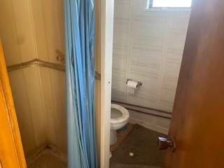 368 Church Hill Road Tionesta, PA 16353 - Photo 17 of 25 a bathroom with a granite countertop toilet and a shower