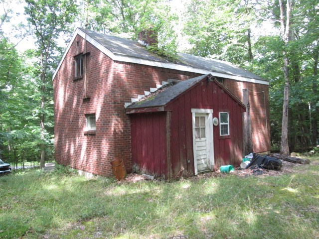 368 Church Hill Road Tionesta, PA 16353 - Photo 8 of 25 a view of barn house with a yard and large trees