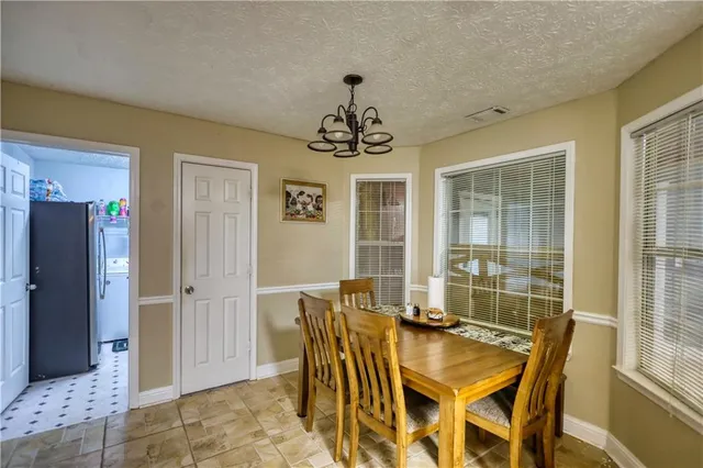 a bathroom with a toilet a sink and a shower