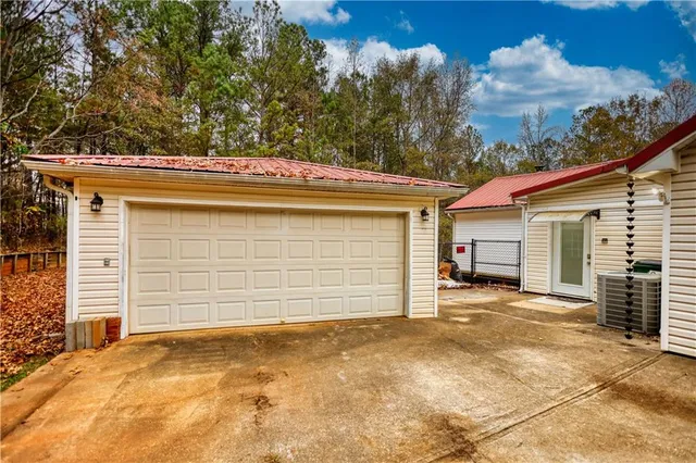 a view of a house with a garage
