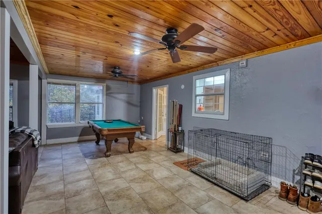 a view of a house with a yard and garage
