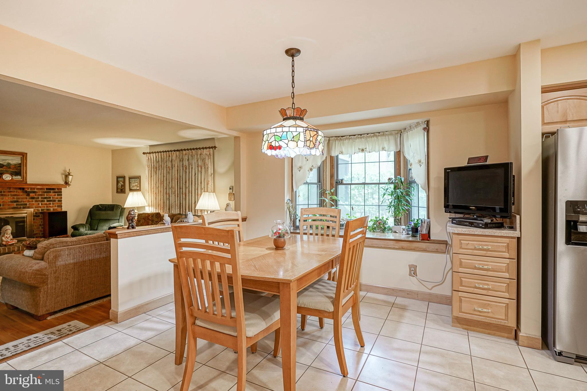 5 Meadowbrook Drive Shamong, NJ 08088 - Photo 15 of 39 a view of a dining room with furniture window and wooden floor