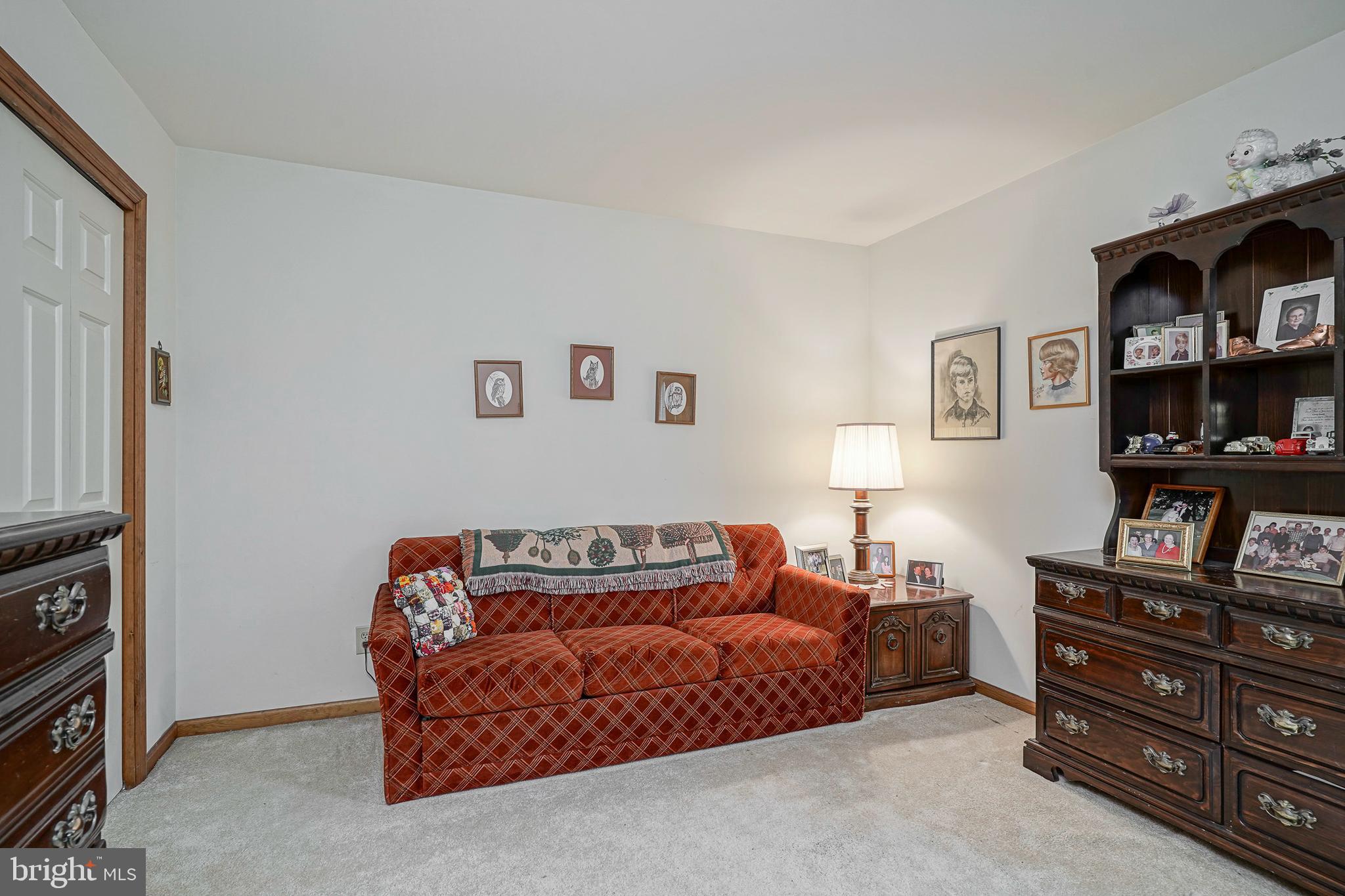 5 Meadowbrook Drive Shamong, NJ 08088 - Photo 26 of 39 a bedroom with furniture and a flat screen tv