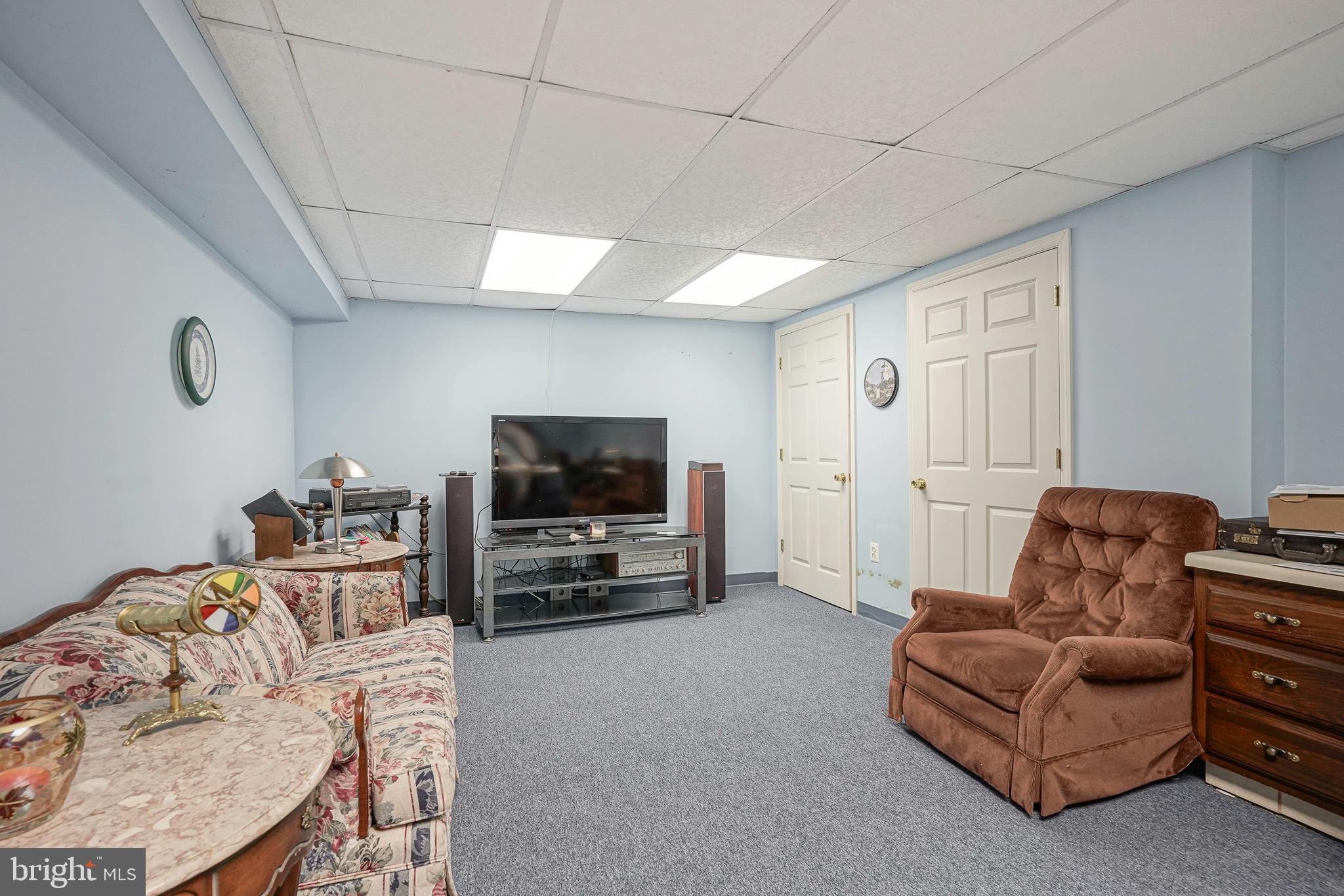 5 Meadowbrook Drive Shamong, NJ 08088 - Photo 30 of 39 a living room with furniture and a flat screen tv