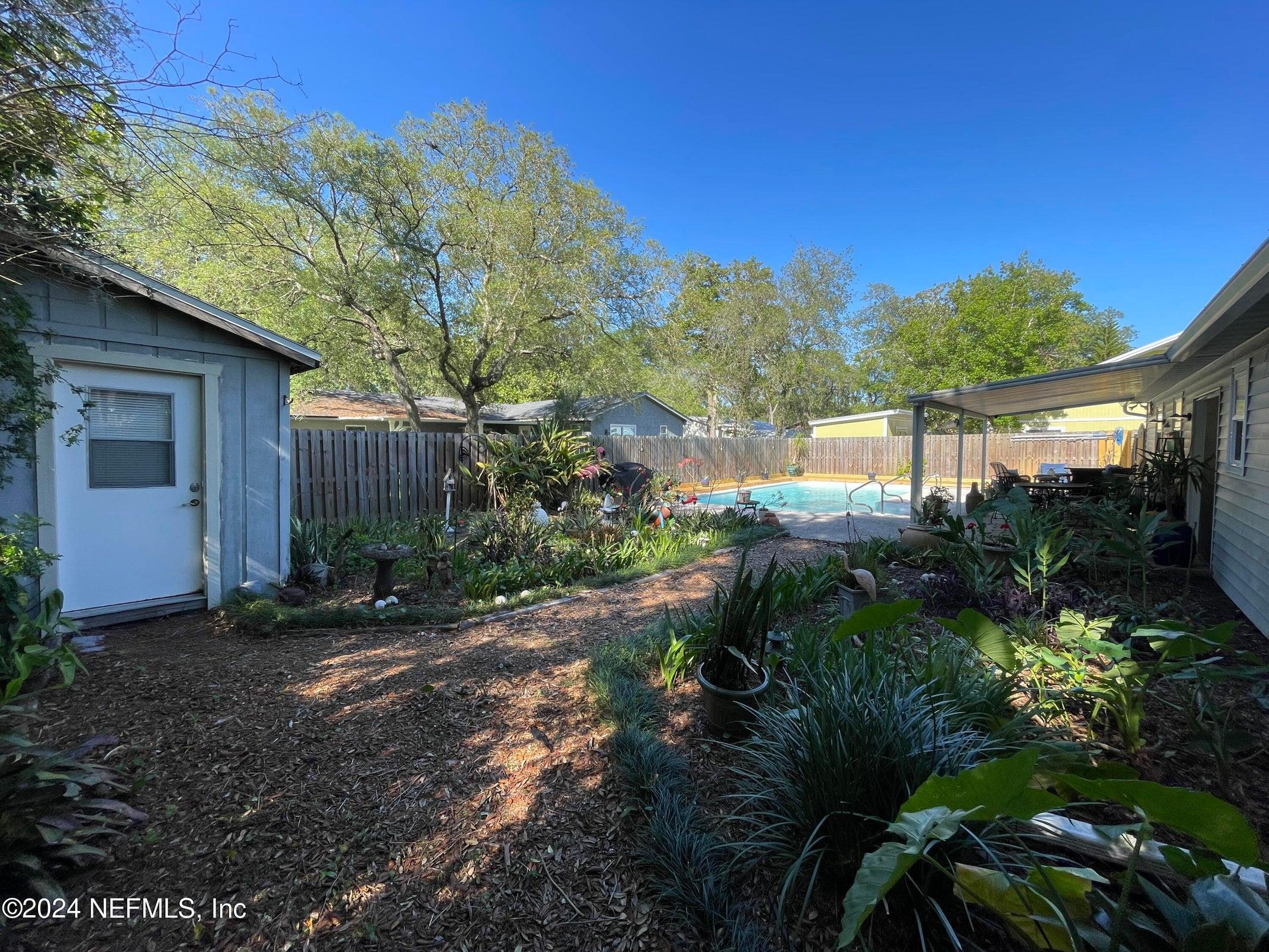 425 Gerona Road St. Augustine, FL 32086 - Photo 25 of 26 a view of backyard with green space