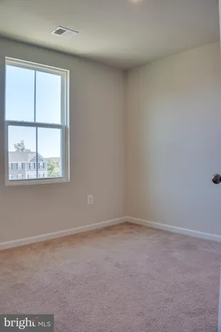 a view of a house with a park