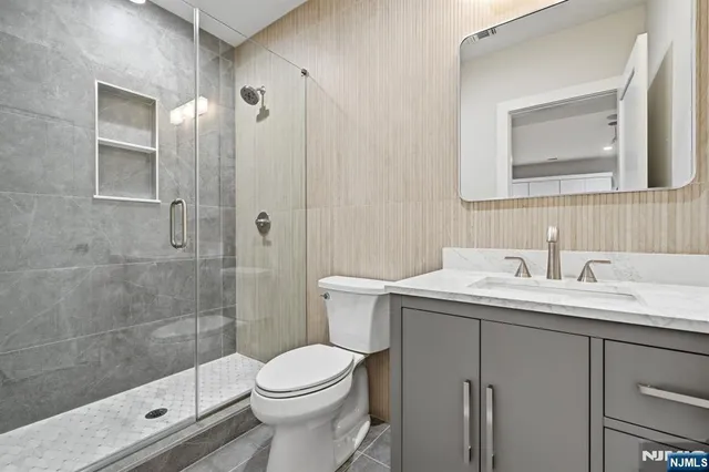 a view of room with wooden floor