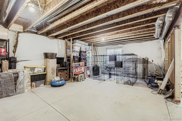 a view of a storage room with racks on the wall