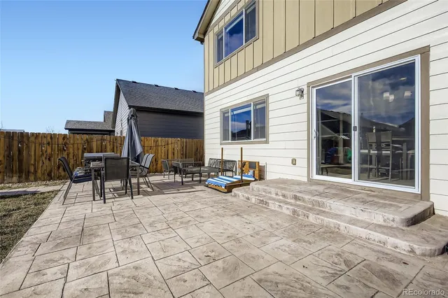 a view of a dinning room with tables and chairs