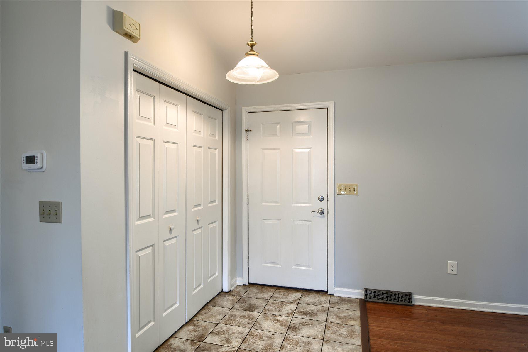 401 Dalton Road Oxford, PA 19363 - Photo 11 of 37 a view of a room with wooden floor and white walls