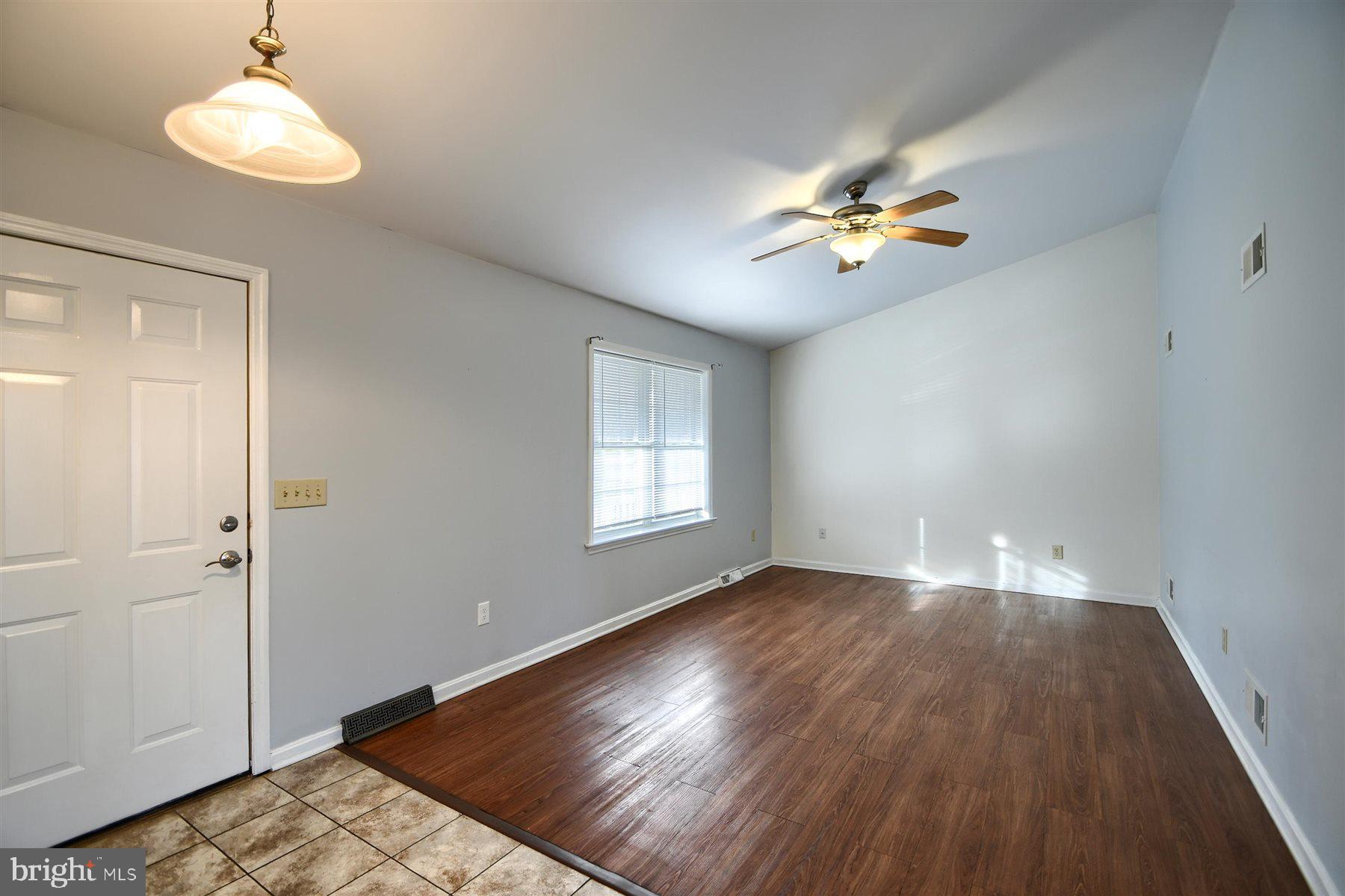 401 Dalton Road Oxford, PA 19363 - Photo 12 of 37 wooden floor in an empty room with a window