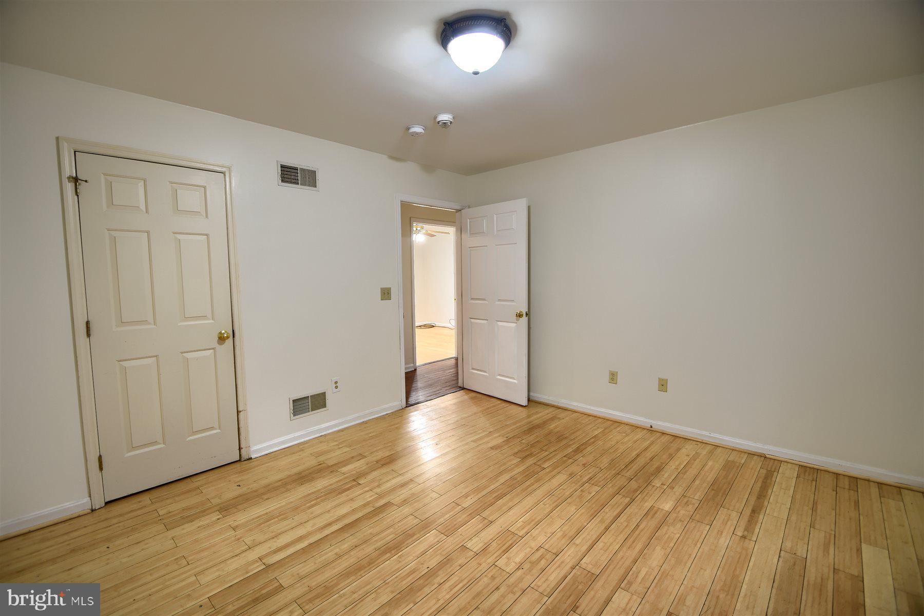 401 Dalton Road Oxford, PA 19363 - Photo 21 of 37 a view of an empty room with wooden floor
