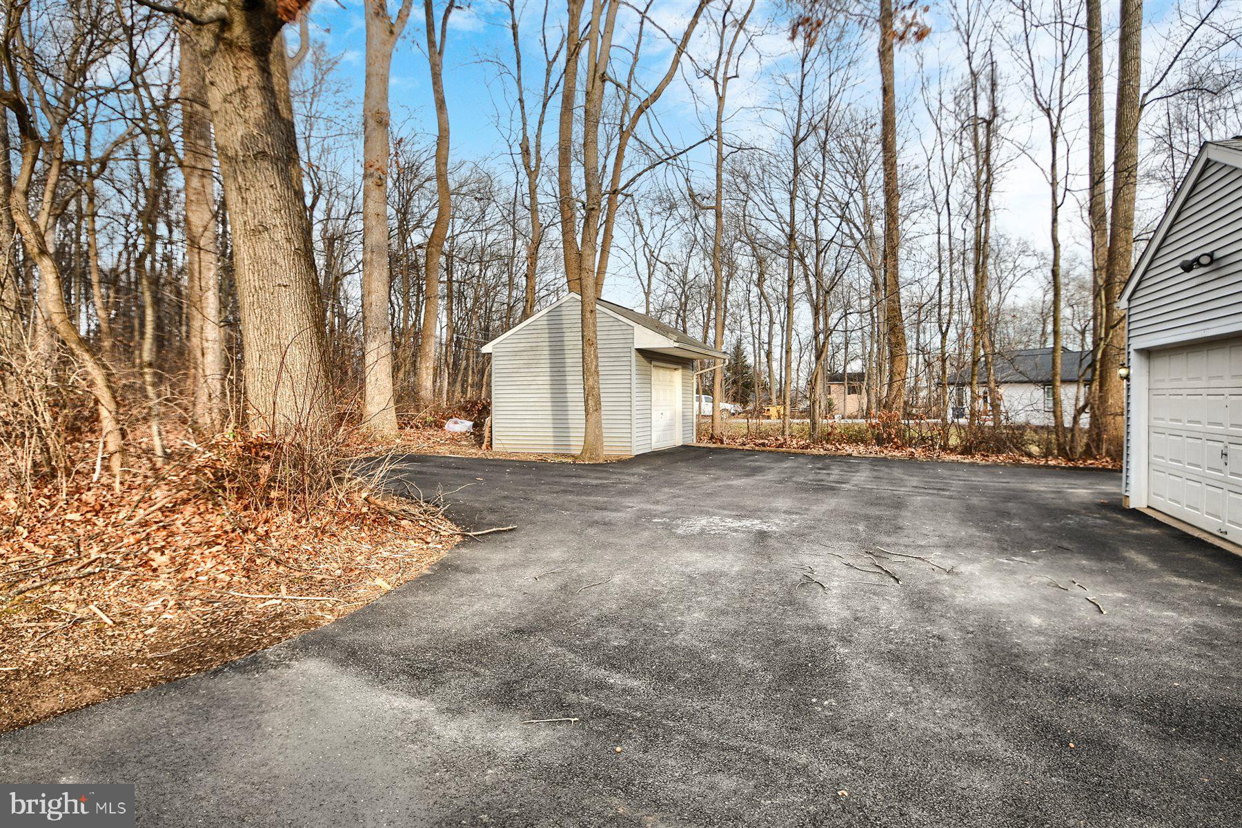 401 Dalton Road Oxford, PA 19363 - Photo 3 of 37 a view of garage yard and tree