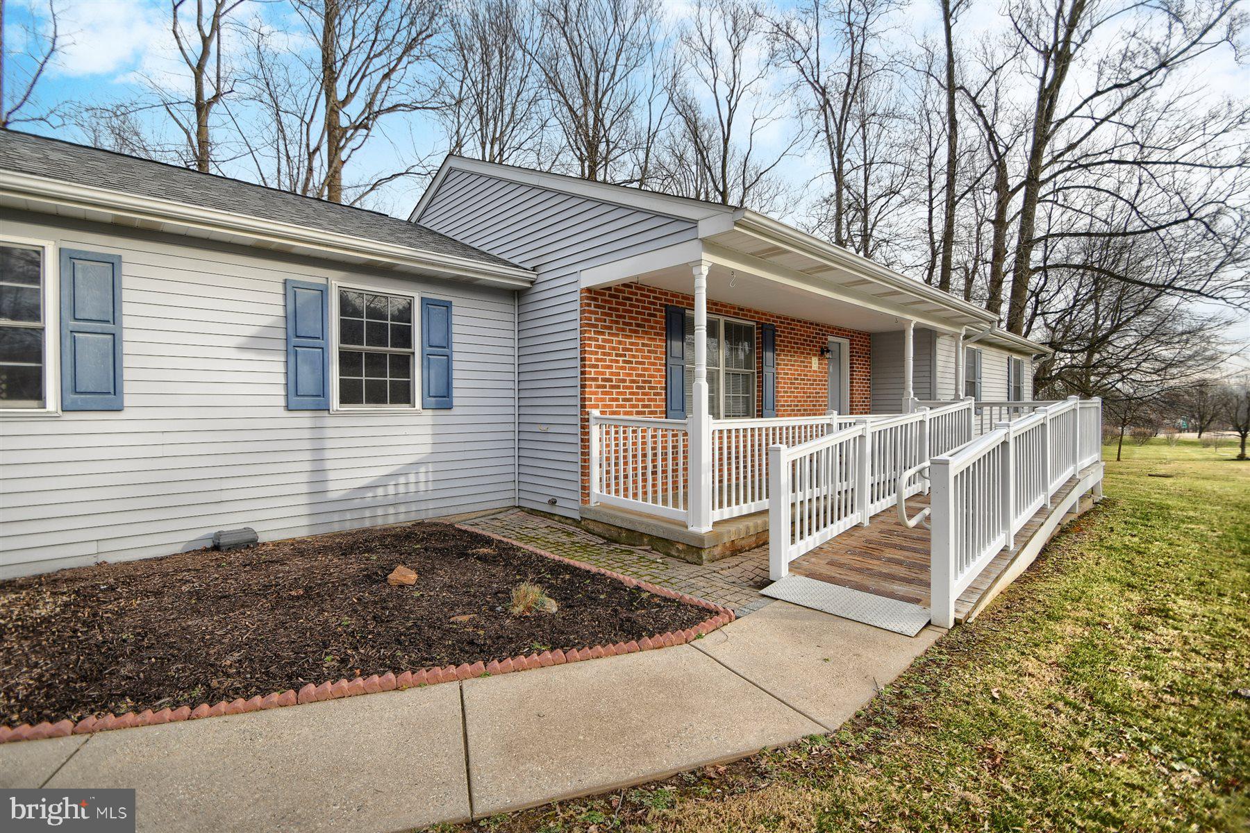 401 Dalton Road Oxford, PA 19363 - Photo 9 of 37 a view of a house with a yard and large tree