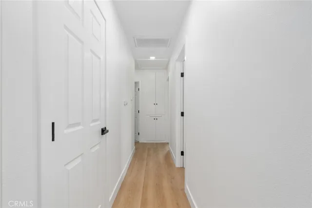 a view of a bathroom from the hallway